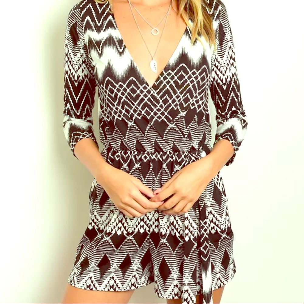 romper  black & white chevron print.  Large
